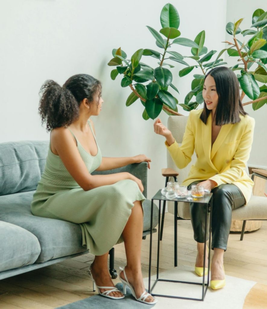 Why work with me sec IMG Elegant lounge interior with chesterfield sofa and champagne